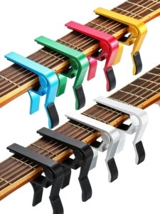 Capo de guitarra elétrica 