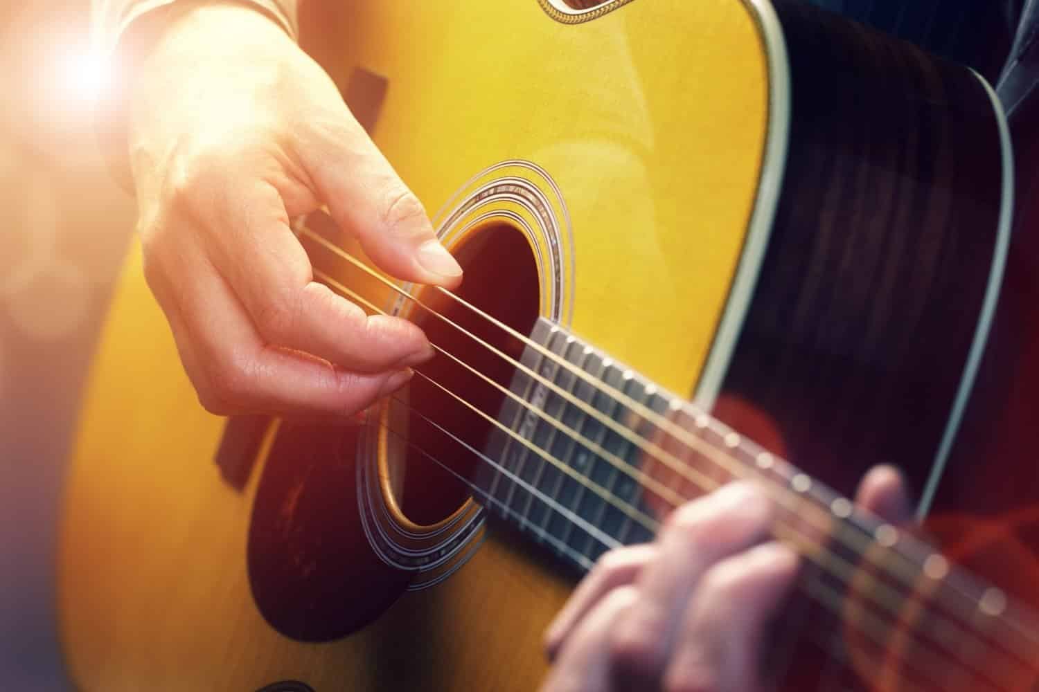 man,playing,an,acoustic,guitar