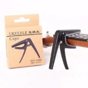 Capo ukulele em ABS