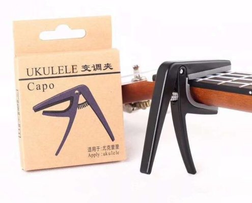 Capo ukulele em ABS