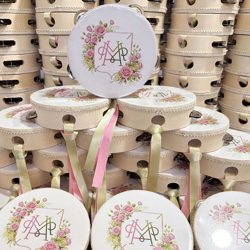 Personalized mini tambourines printed with names and wedding dates