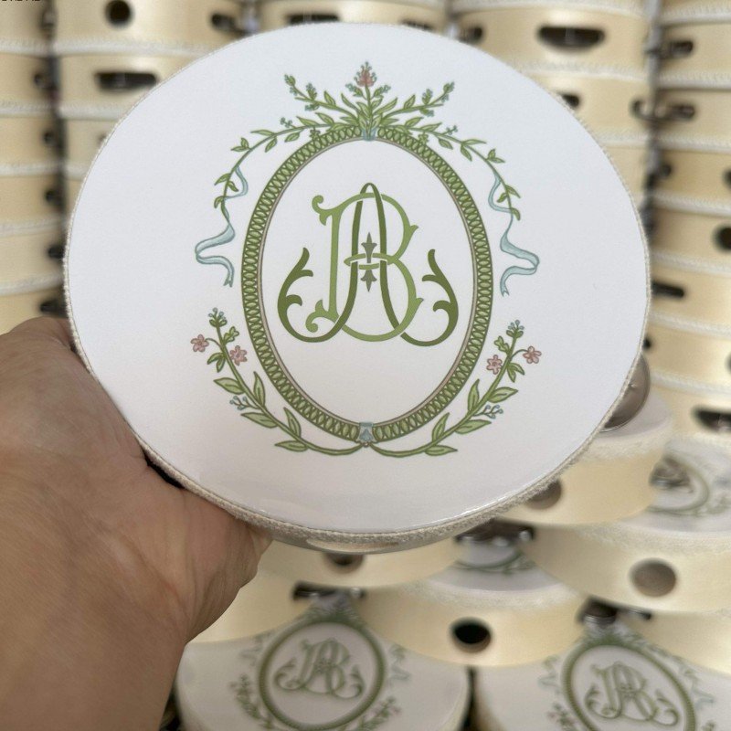 Close-up of a 6 inch tambourine with wooden frame and drum head