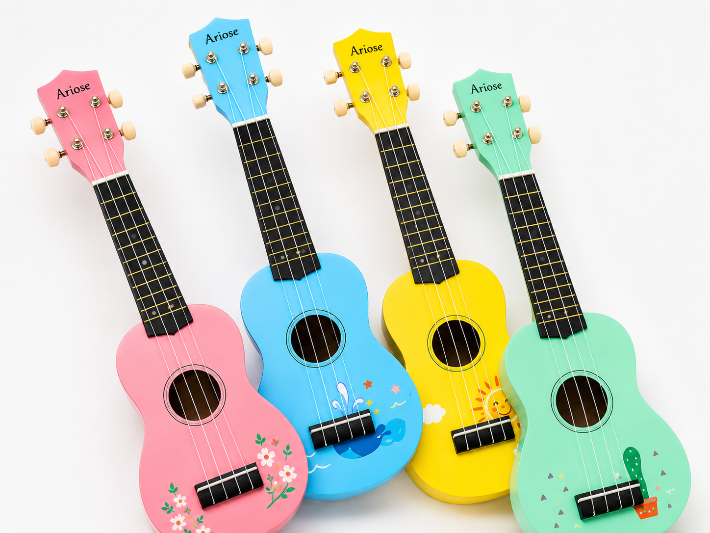 Ukulélés colorés pour enfants avec des motifs imprimés personnalisés, parfaits pour les écoles et les cadeaux.