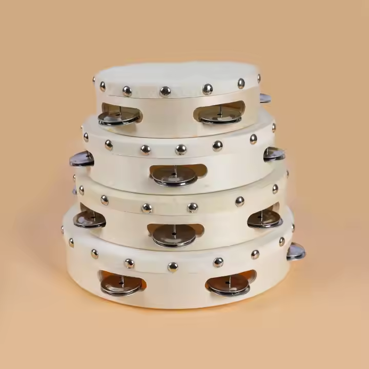 children using small tambourines in music class